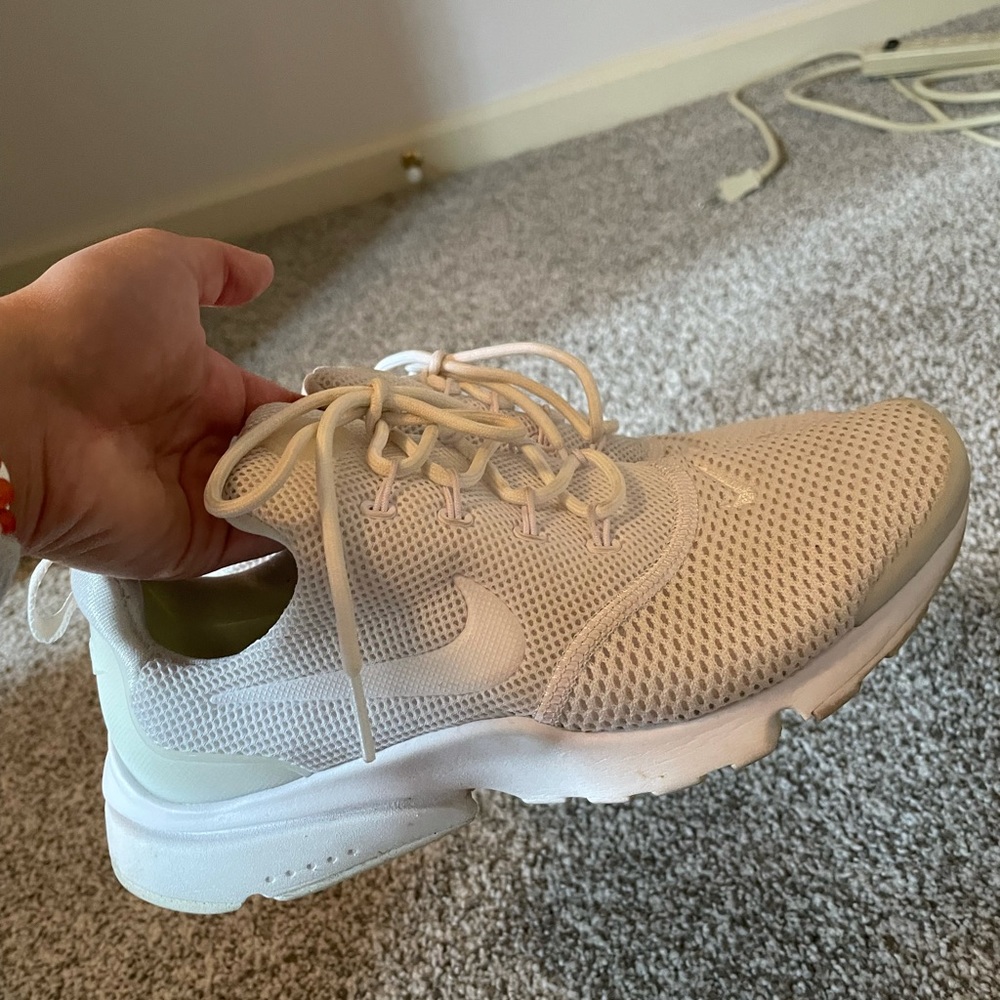 slightly worn nike sneakers